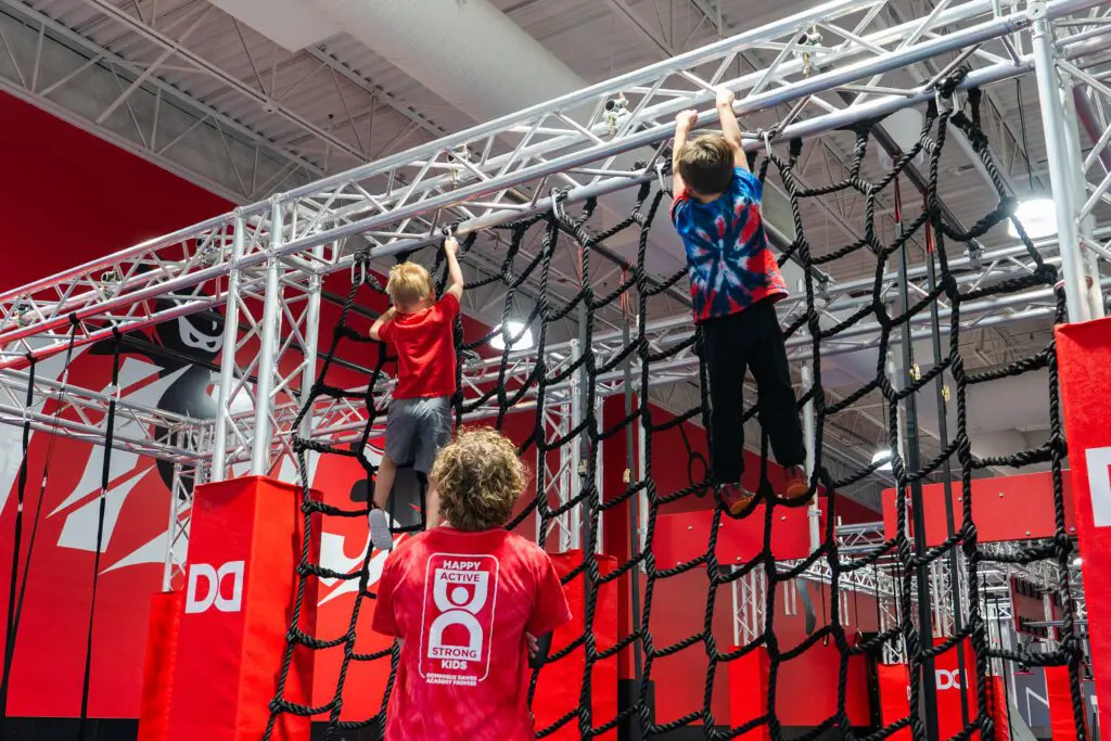 Kids on obstacle course during Ninja Summer Camp