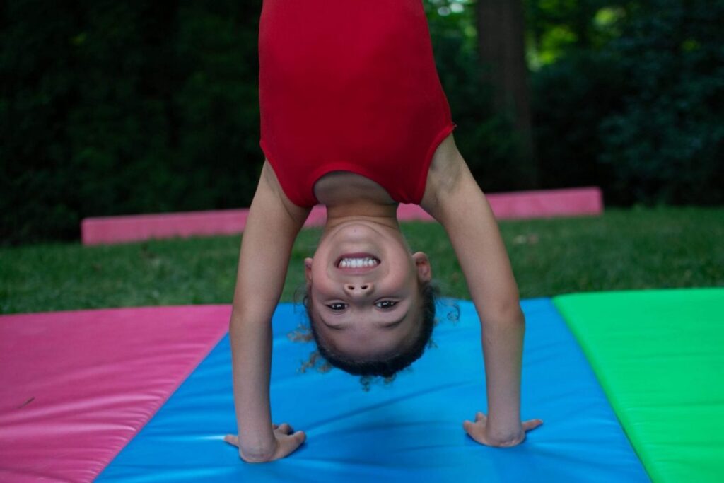 kid doing gymnastics