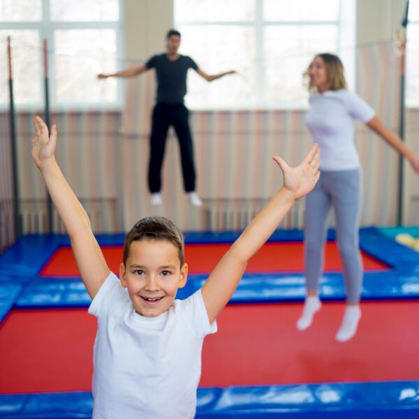 Family In Trampoline Center