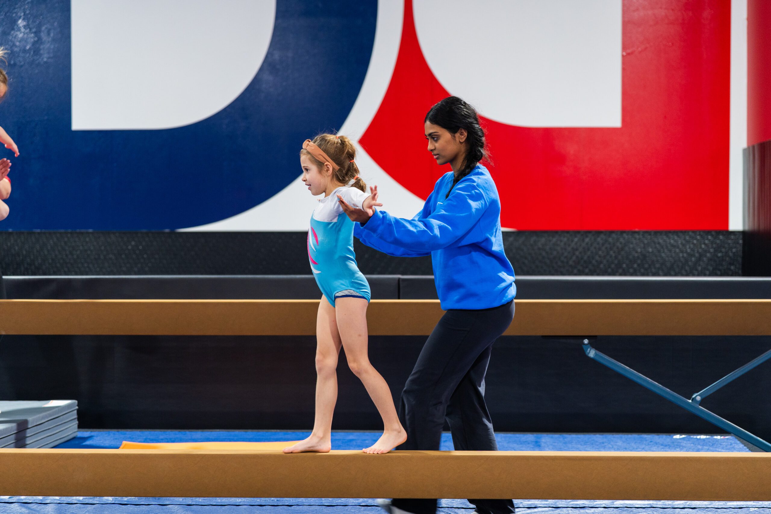 Read more about the article Your New Family Gymnastics Home in Houston: Inside Our Jersey Village & Spring Academies