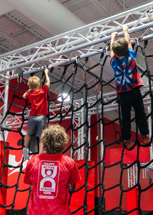 Kids on obstacle course during Ninja Summer Camp