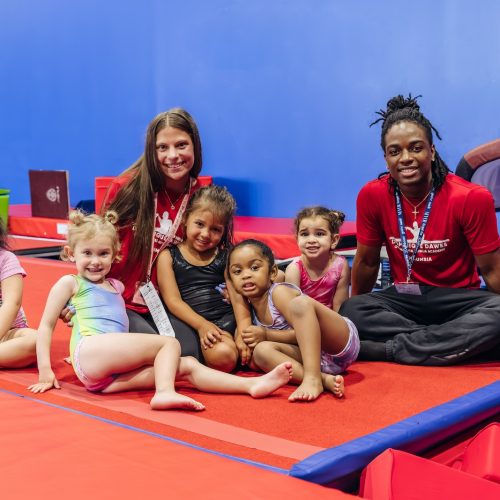 Working with kids at Dominique Dawes Academy