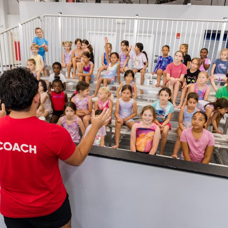 Working with kids at Dominique Dawes Academy