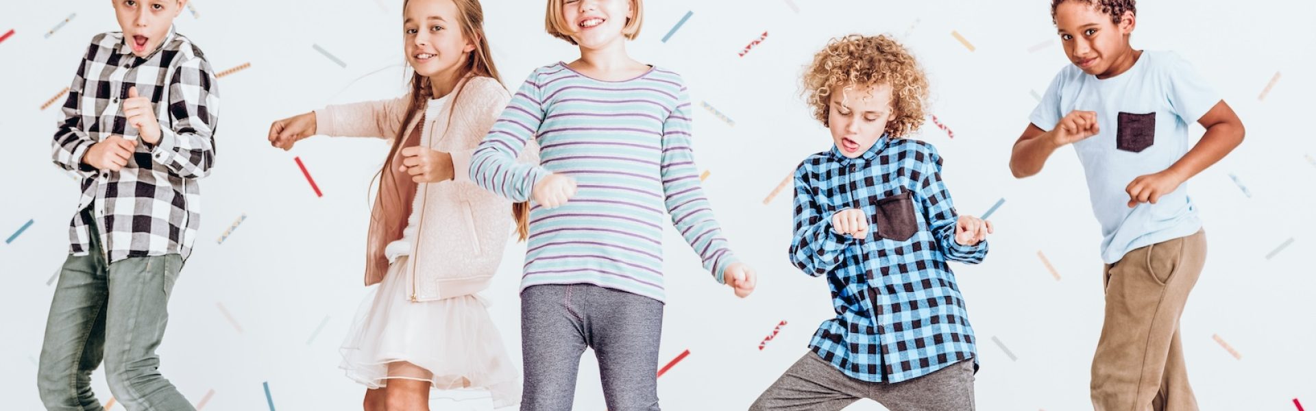 Group of kids having fun and dancing